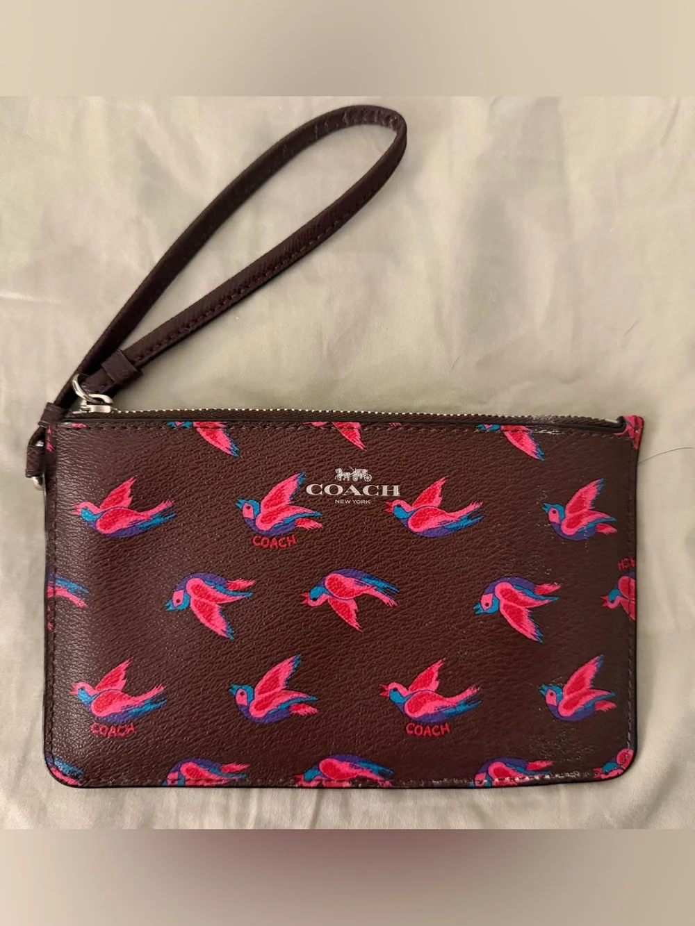 COACH Brown Leather Wristlet with Pink & Blue Bird Motif
